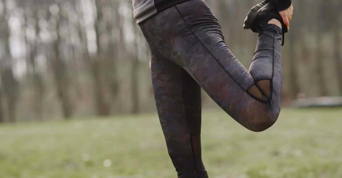 5 Étirements Essentiels Avant de Courir